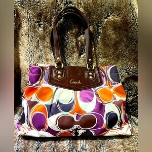 Coach medium double handle shoulder bag.Multi color orange purple logo print.
